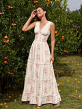 Woman smiling in a floral print maxi dress with lace trim outdoors