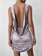 Front view of a grey satin V-neck mini dress.