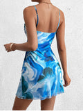 Back view of a blue floral print cami mini dress