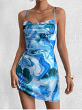 Close-up of the draped neckline on a floral print cami mini dress