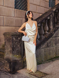Elegant white satin halter neck dress with draped detailing