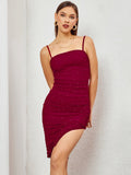 Front view of a woman in a red embellished ruched midi dress with a square neckline and ruched detailing.