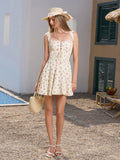 Full body shot of a woman in a floral print dress with a straw bag