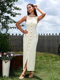 Close-up of the buttons and pockets on a beige midi dress