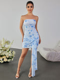 Full length shot of a model showcasing a strapless ruched mesh dress