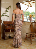 Back view of a woman in a long, ruched, off-the-shoulder dress with a floral print.