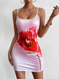 close-up of a pink bodycon dress with a bold red flower graphic