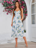 Full-body shot of a woman wearing a white floral midi dress with side pockets, standing in an outdoor setting.