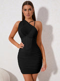 Model showcasing a black asymmetrical ruched bodycon dress with corset detailing