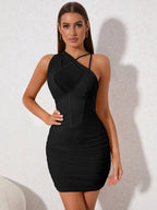 Model showcasing a black asymmetrical ruched bodycon dress with corset detailing