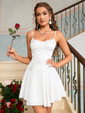 Woman with a red rose, wearing a white satin dress with lace overlay and a pleated skirt.
