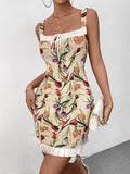 Woman in a floral print dress with a white clutch handbag