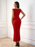 Back view of a woman in a red fitted midi dress with a square neckline