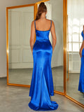 Back view of a woman in a royal blue satin mermaid evening gown, showcasing the criss-cross back detail and long train.