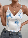 Detail shot of the white floral print corset top, highlighting the print and trim.
