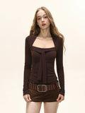 Model showcasing a long sleeve tie neck top