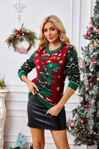 Front view of festive T-Rex knit sweater