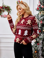 Side profile of a woman in a patterned holiday sweater.