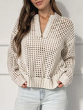 Front view of a cream open knit sweater with a half-zip neckline