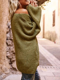 Side view of a woman wearing the olive green knit sweater, with one shoulder exposed, showcasing the oversized silhouette and sleeves.