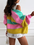 Back view of a woman wearing a vibrant striped knit cardigan