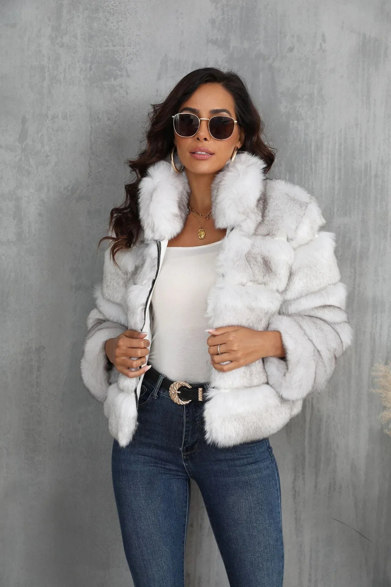Woman smiling in a stylish faux fur jacket
