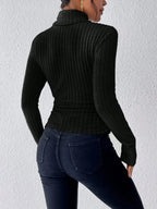 Back view of a black fitted turtleneck shirt