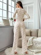 Back view of woman in floral print pajama set