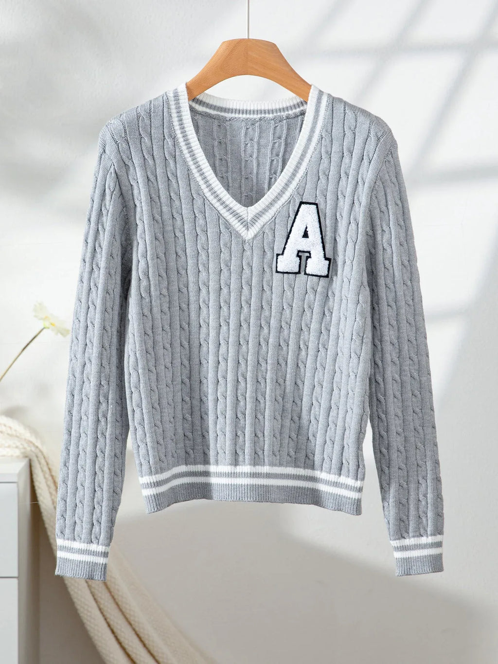 Grey cable knit V-neck sweater with white contrast trim and chenille letter patch - View 6 | WEUXS