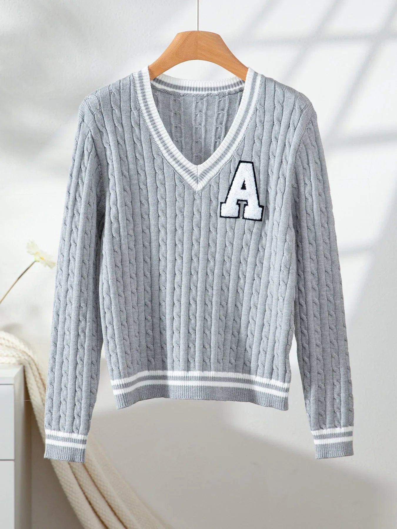 Grey cable knit V-neck sweater with white contrast trim and chenille letter patch - View 6 | WEUXS