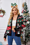 Woman wearing an open black Christmas print cardigan over a white top, with red buttons and long sleeves.