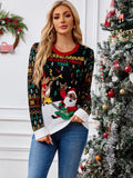 Woman wearing a black knit sweater with a Santa Claus playing guitar and a reindeer graphic, surrounded by musical notes and trees. The sweater has a red crew neck and white cuffs and hem.
