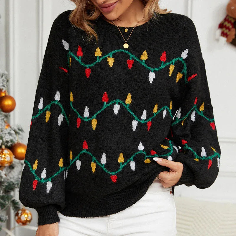 Close-up of a festive knit sweater with colorful light bulb design