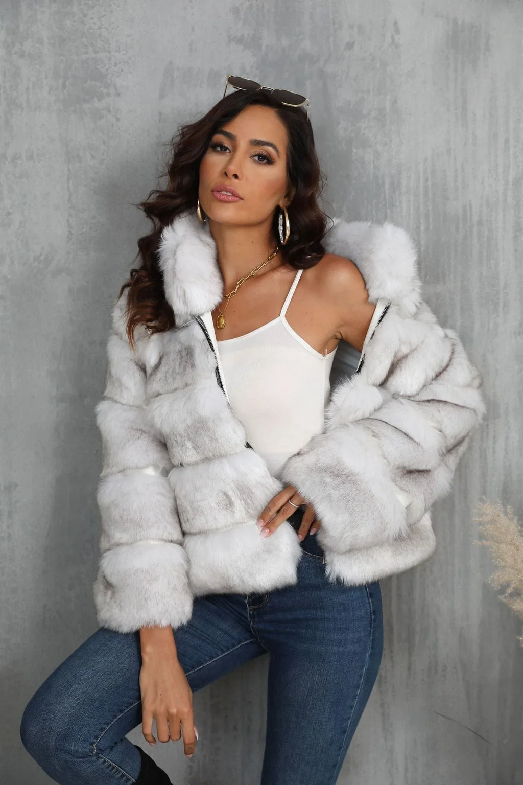 Model posing in a chic faux fur cropped outerwear