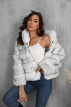Model posing in a chic faux fur cropped outerwear