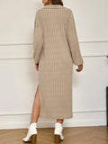 Back view of a woman in a beige ribbed knit maxi dress with a side slit