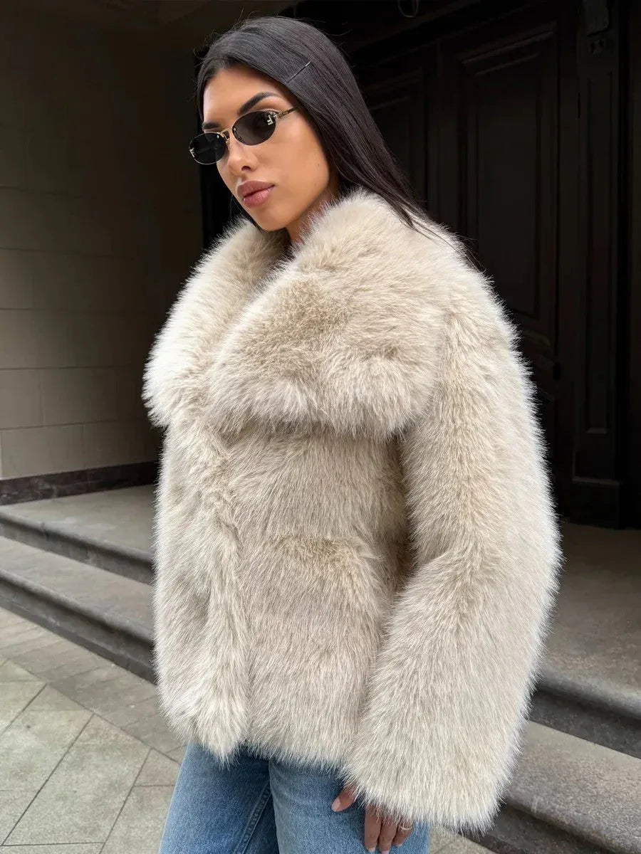 Close-up of the plush texture of an oversized lapel faux fur jacket