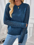 Woman wearing a blue knit sweater with openwork sleeves