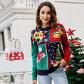 Close-up of a colorful holiday knit sweater featuring a Christmas tree and bells.