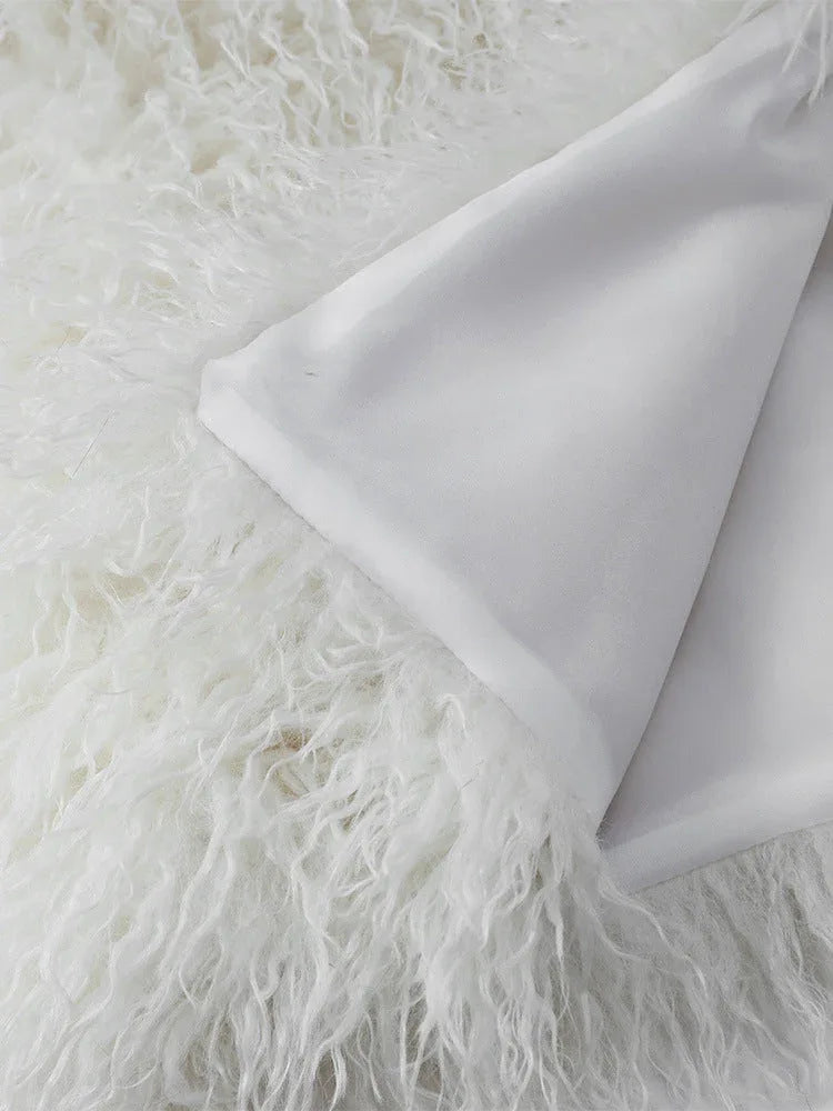 Cream shaggy faux fur fabric with white lining