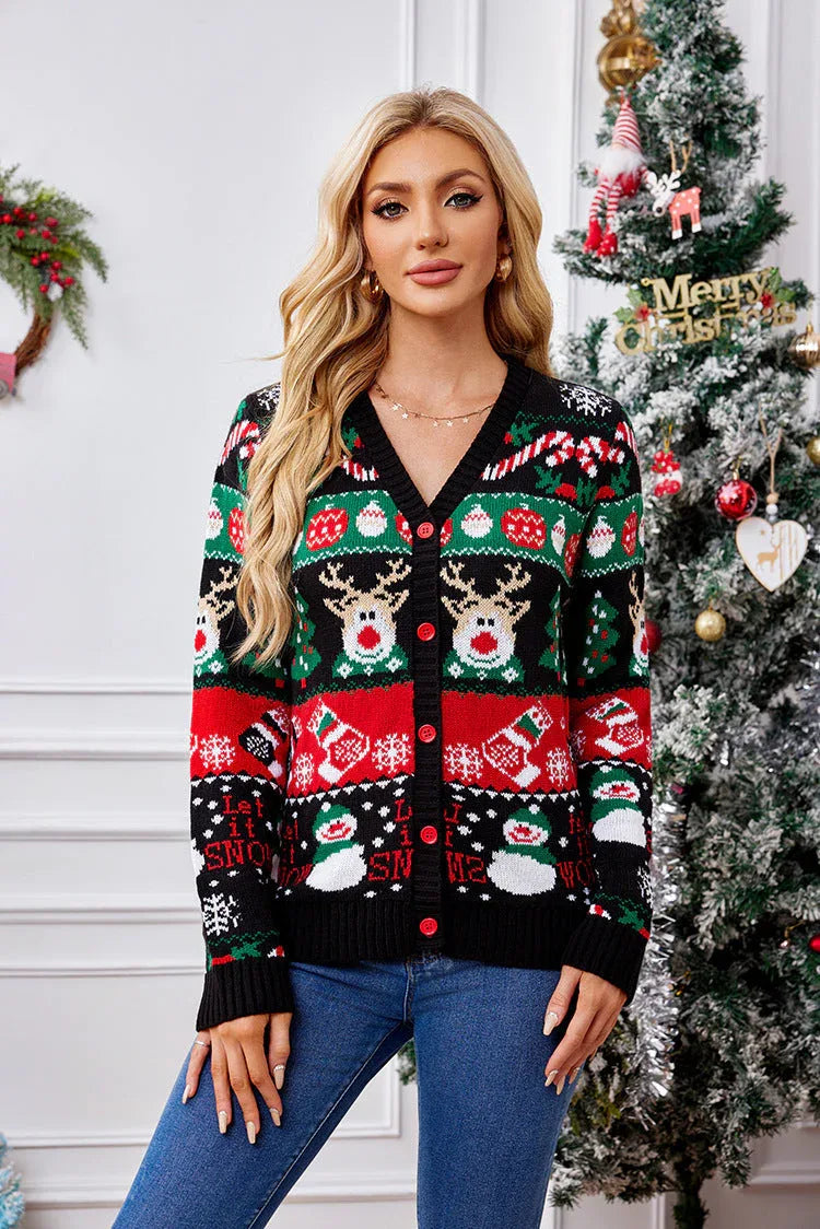 Woman wearing a black Christmas print cardigan with red buttons, V-neck, and long sleeves.