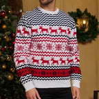 Man in a white and red Christmas sweater featuring a repeating reindeer motif