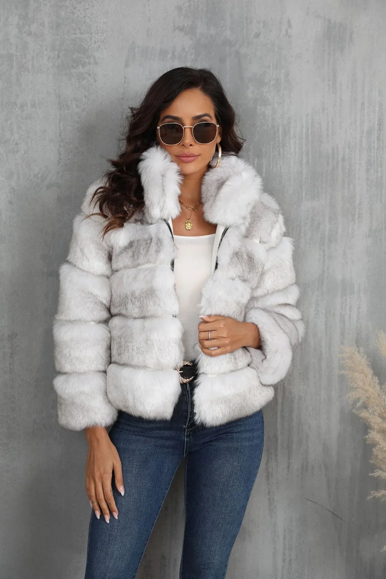 Woman wearing a white faux fur cropped jacket Main image