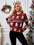 Front view of a woman in a festive knit sweater with holiday-themed patterns.