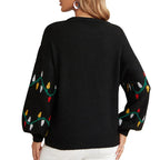 Back view of a black holiday sweater with balloon sleeves