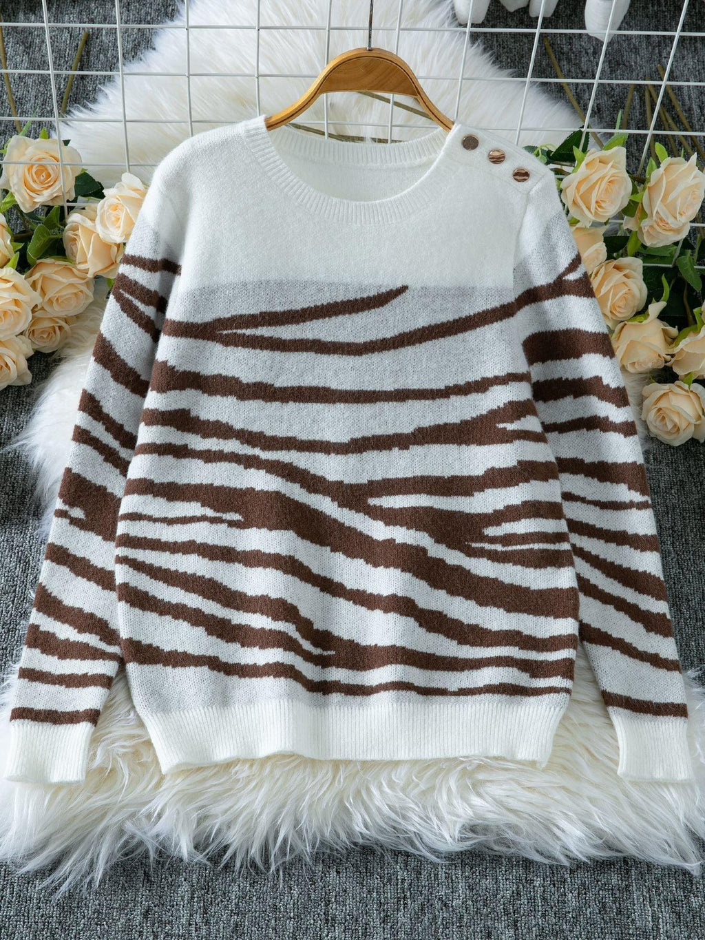 Woman wearing a white and brown zebra print crew neck sweater - View 7 | WEUXS