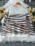 Woman wearing a white and brown zebra print crew neck sweater - View 7 | WEUXS