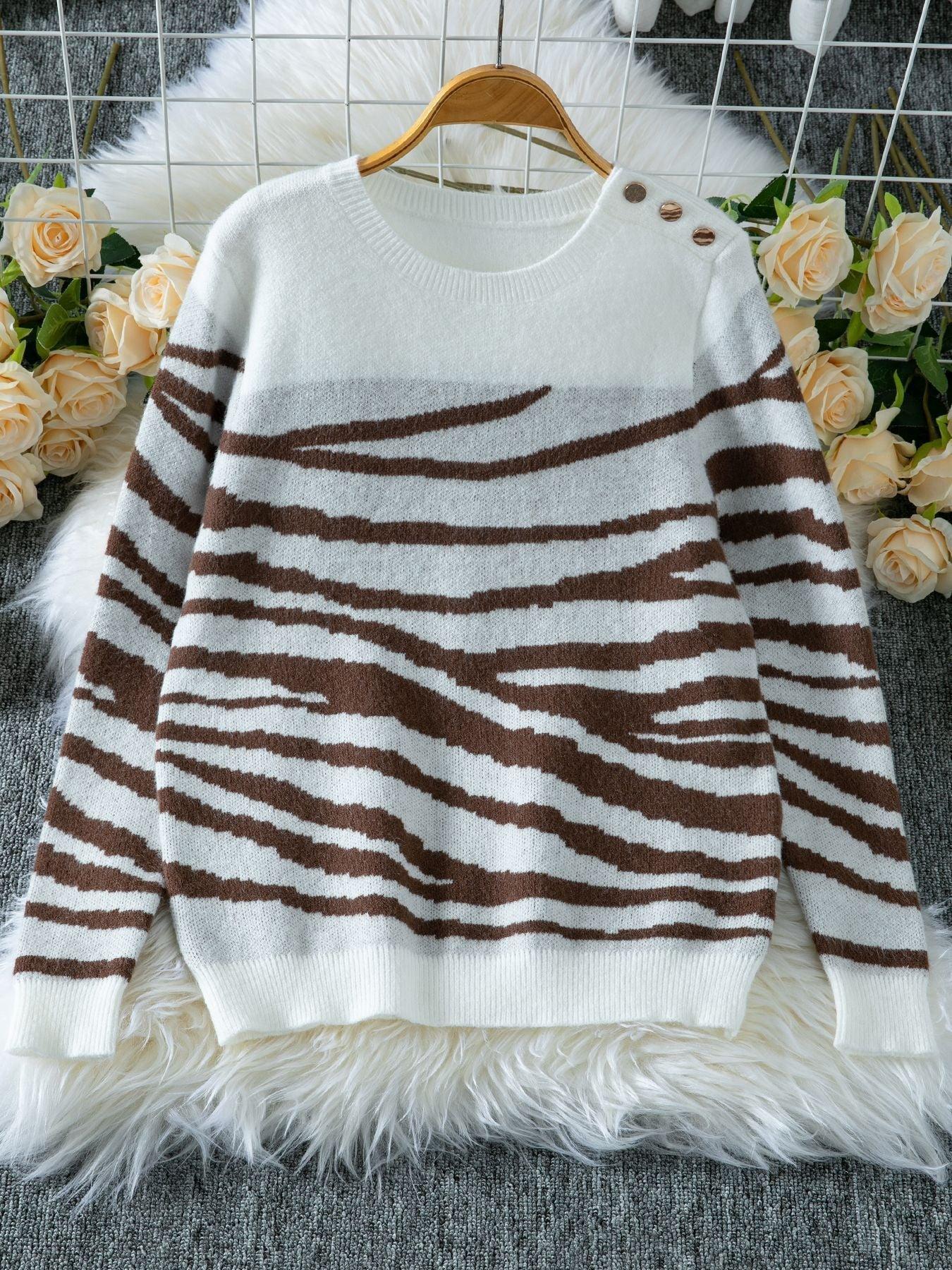 Woman wearing a white and brown zebra print crew neck sweater - View 7 | WEUXS
