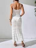 Back view of a white crochet fringe maxi dress