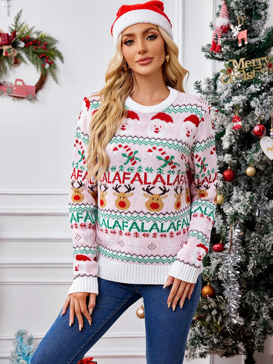 woman in pink festive knit sweater with holiday print